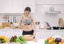 The Must-Follow Lifestyle Bloggers Who Will Change Your Life A lifestyle blogger taking a picture of healthy food to share with followers online